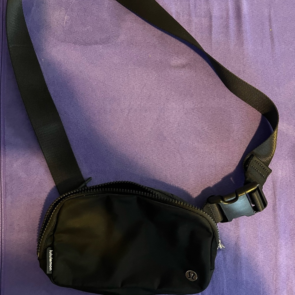 Never used, black lululemon belt bag